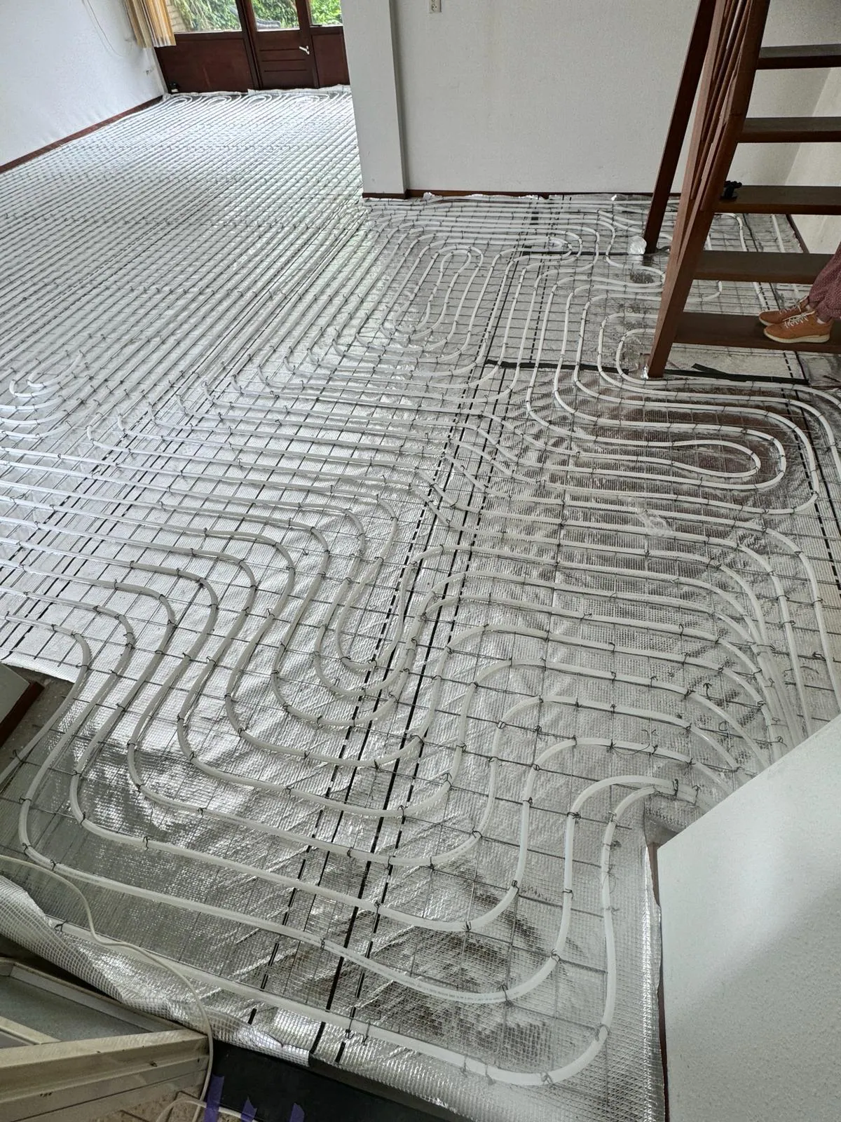 Vloerverwarmingsleidingen op isolatie in project van Correct Vloerverwarming